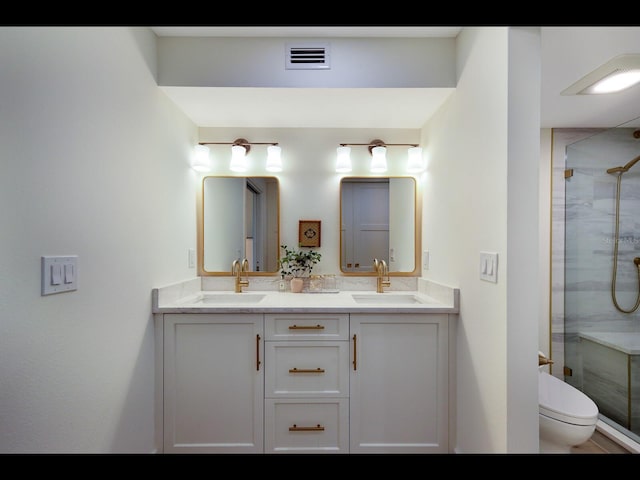 2045 Gulf Of Mexico Dr Unit M1-505, Longboat Key, FL 34228 - full bath with double vanity, a shower stall, and toilet