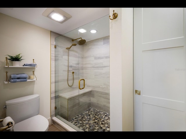 2045 Gulf Of Mexico Dr Unit M1-505, Longboat Key, FL 34228 - bathroom featuring toilet, a shower stall, and recessed lighting