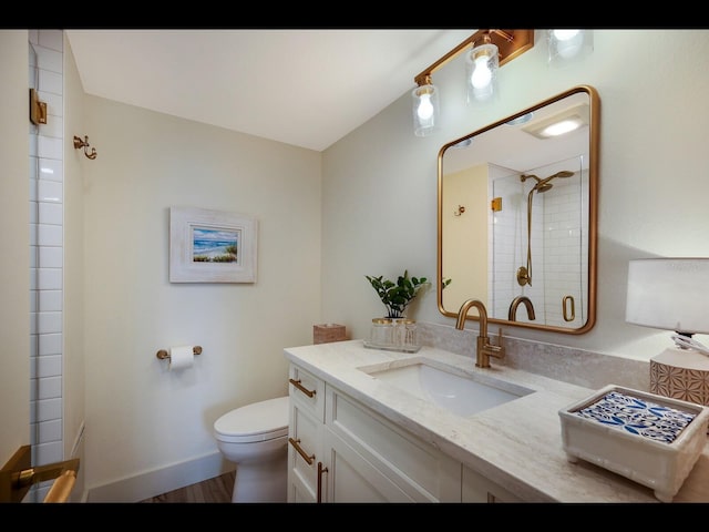 2045 Gulf Of Mexico Dr Unit M1-505, Longboat Key, FL 34228 - full bathroom featuring toilet, vanity, a shower with door, and baseboards