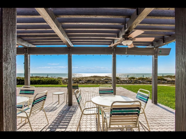 2045 Gulf Of Mexico Dr Unit M1-505, Longboat Key, FL 34228 - view of patio featuring a pergola, a water view, and a ceiling fan