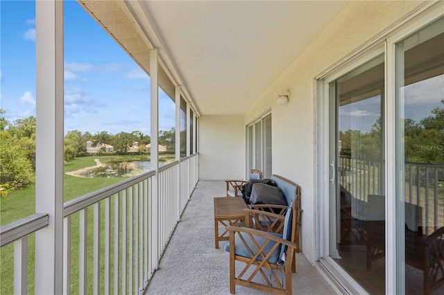 7532 Marsh Orchid Cir Unit 8-201, Bradenton, FL 34203 - balcony featuring a water view