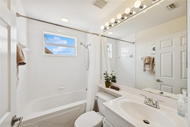 7532 Marsh Orchid Cir Unit 8-201, Bradenton, FL 34203 - full bathroom with vanity, shower / bathtub combination with curtain, and toilet