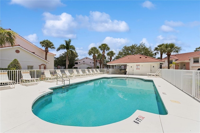 7532 Marsh Orchid Cir Unit 8-201, Bradenton, FL 34203 - community pool featuring a patio area