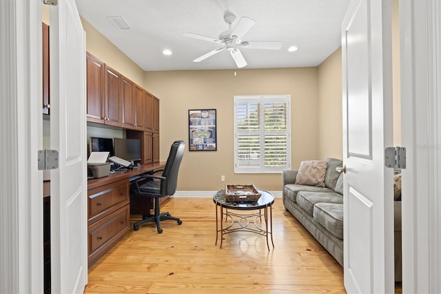 5373 Anthony Ln, Sarasota, FL 34233 - office featuring light wood finished floors, a ceiling fan, baseboards, recessed lighting, and built in study area