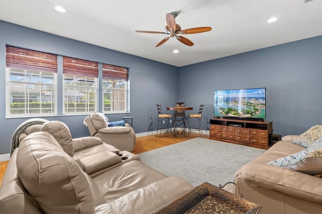 5373 Anthony Ln, Sarasota, FL 34233 - living room featuring wood finished floors, a ceiling fan, plenty of natural light, baseboards, and recessed lighting