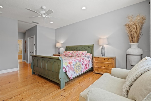 5373 Anthony Ln, Sarasota, FL 34233 - bedroom with wood finished floors, recessed lighting, a ceiling fan, and baseboards