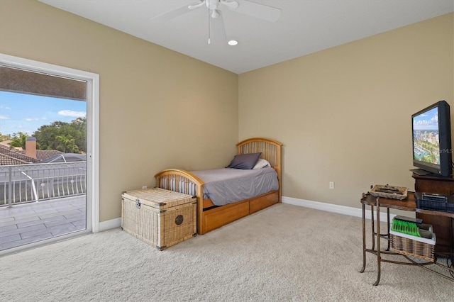 5373 Anthony Ln, Sarasota, FL 34233 - bedroom with access to exterior, carpet floors, baseboards, and a ceiling fan