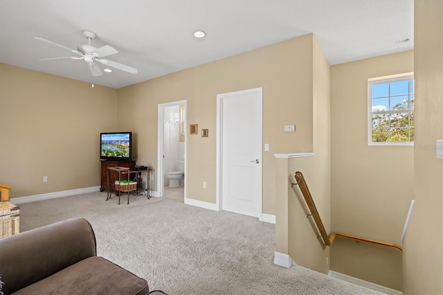 5373 Anthony Ln, Sarasota, FL 34233 - carpeted living room featuring baseboards, a ceiling fan, and recessed lighting