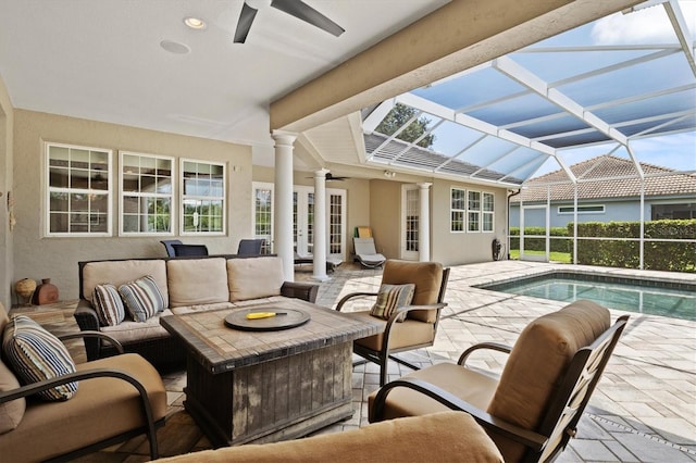 5373 Anthony Ln, Sarasota, FL 34233 - view of patio featuring ceiling fan, outdoor lounge area, and an outdoor pool