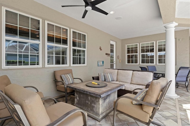 5373 Anthony Ln, Sarasota, FL 34233 - view of patio featuring ceiling fan and an outdoor living space with a fire pit
