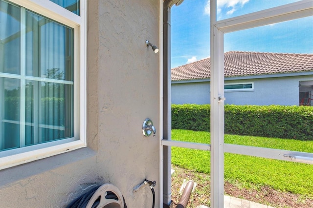 5373 Anthony Ln, Sarasota, FL 34233 - detailed view of stucco siding