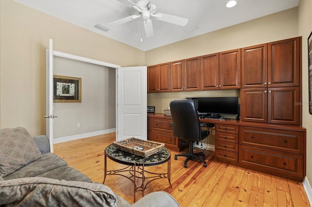 5373 Anthony Ln, Sarasota, FL 34233 - home office with built in study area, a ceiling fan, light wood finished floors, baseboards, and recessed lighting