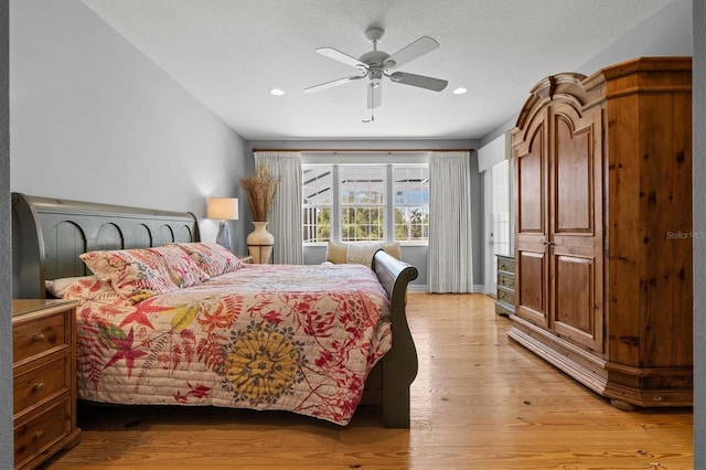 5373 Anthony Ln, Sarasota, FL 34233 - bedroom with light wood-style flooring, recessed lighting, and a ceiling fan