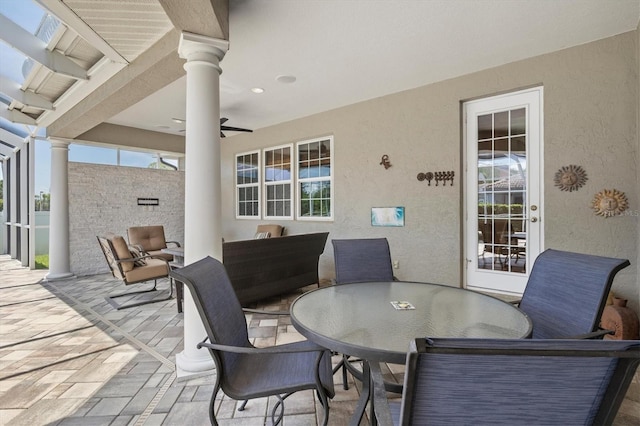 5373 Anthony Ln, Sarasota, FL 34233 - view of patio featuring ceiling fan, outdoor dining area, and outdoor lounge area