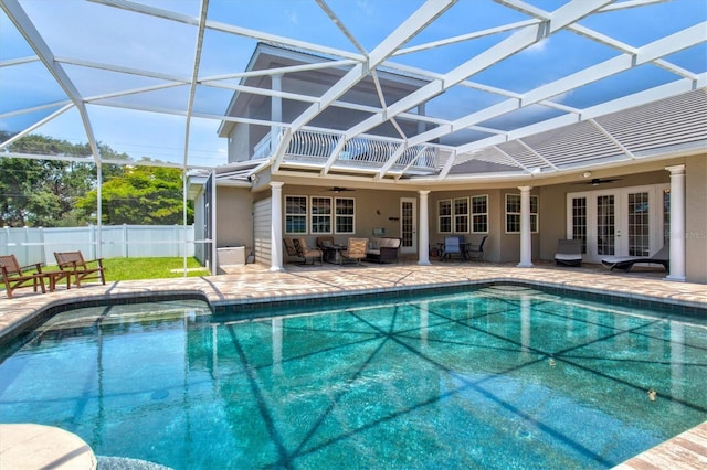 5373 Anthony Ln, Sarasota, FL 34233 - view of swimming pool with french doors, ceiling fan, a patio, and glass enclosure