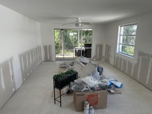 669 Spanish Dr N Unit 21, Longboat Key, FL 34228 - living area featuring a ceiling fan