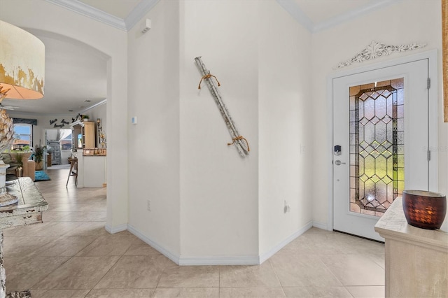12230 Amica Loop, Venice, FL 34293 - entrance foyer with ornamental molding, baseboards, arched walkways, and light tile patterned flooring