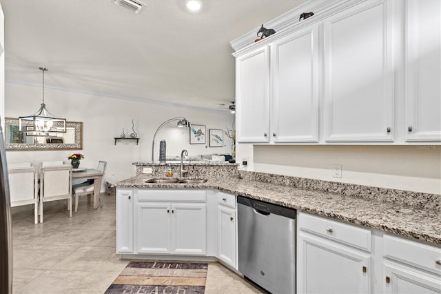 12230 Amica Loop, Venice, FL 34293 - kitchen with dishwasher, a sink, white cabinets, a ceiling fan, and a peninsula