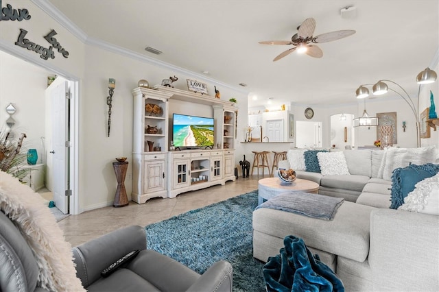 12230 Amica Loop, Venice, FL 34293 - living area featuring ornamental molding, a ceiling fan, baseboards, and tile patterned floors