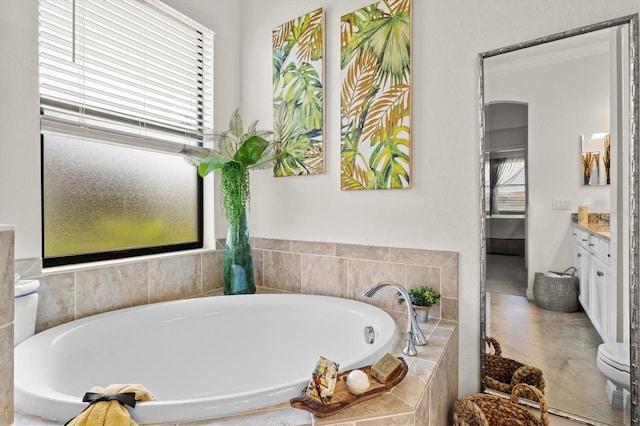 12230 Amica Loop, Venice, FL 34293 - bathroom featuring vanity, a bath, and toilet