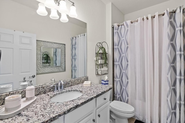 12230 Amica Loop, Venice, FL 34293 - bathroom with vanity, toilet, a chandelier, and a shower with curtain