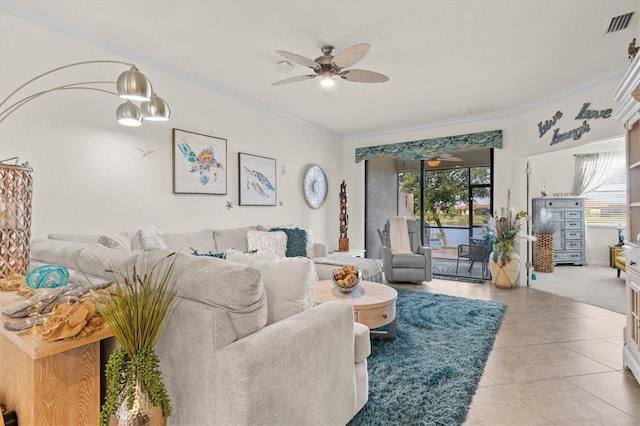 12230 Amica Loop, Venice, FL 34293 - living area with a ceiling fan, ornamental molding, and light tile patterned flooring