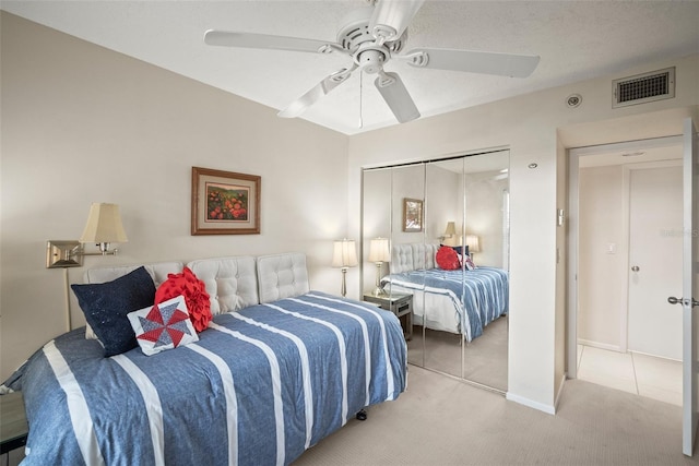 4530 Pinebrook Cir Unit 109, Bradenton, FL 34209 - bedroom featuring carpet, a closet, and a ceiling fan