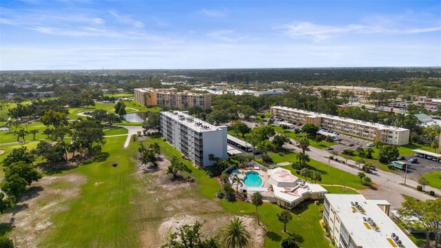 4530 Pinebrook Cir Unit 109, Bradenton, FL 34209 - aerial view of apartment complex, a pool area, a local golf course, and a large body of water