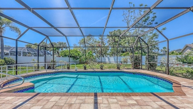 4308 Kingston Loop, Sarasota, FL 34238 - view of pool featuring a fenced backyard and glass enclosure