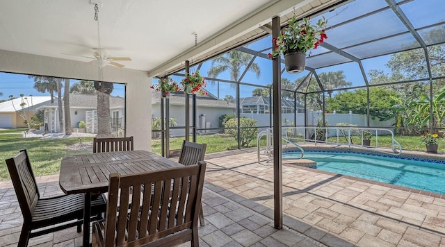 4308 Kingston Loop, Sarasota, FL 34238 - view of pool featuring a patio area, a ceiling fan, glass enclosure, and outdoor dining space