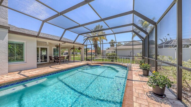 4308 Kingston Loop, Sarasota, FL 34238 - swimming pool with a patio, a lanai, and outdoor dining space