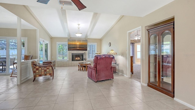 4308 Kingston Loop, Sarasota, FL 34238 - living room with healthy amount of natural light, baseboards, and a fireplace