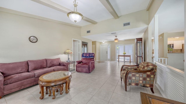 4308 Kingston Loop, Sarasota, FL 34238 - living area with beamed ceiling, light tile patterned flooring, and a ceiling fan