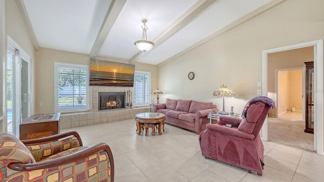 4308 Kingston Loop, Sarasota, FL 34238 - living room with light tile patterned floors, plenty of natural light, and a tiled fireplace