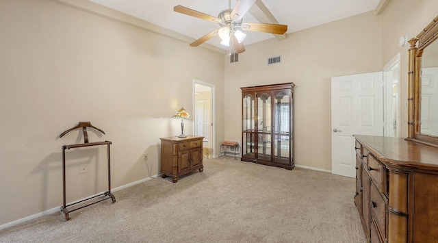 4308 Kingston Loop, Sarasota, FL 34238 - sitting room with light carpet, ceiling fan, baseboards, and a towering ceiling