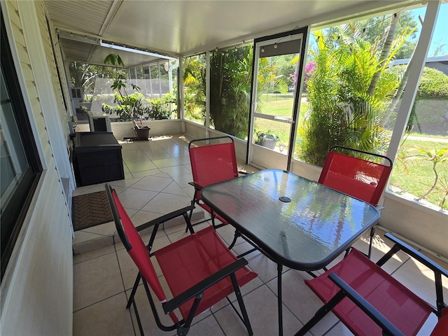 4213 E Michigan St Unit 4213, Orlando, FL 32812 - sunroom / solarium with outdoor dining area