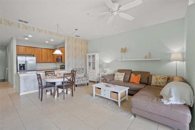 4204 Overture Cir # 4204, Bradenton, FL 34209 - living room with ceiling fan, light tile patterned flooring, recessed lighting, and wallpapered walls