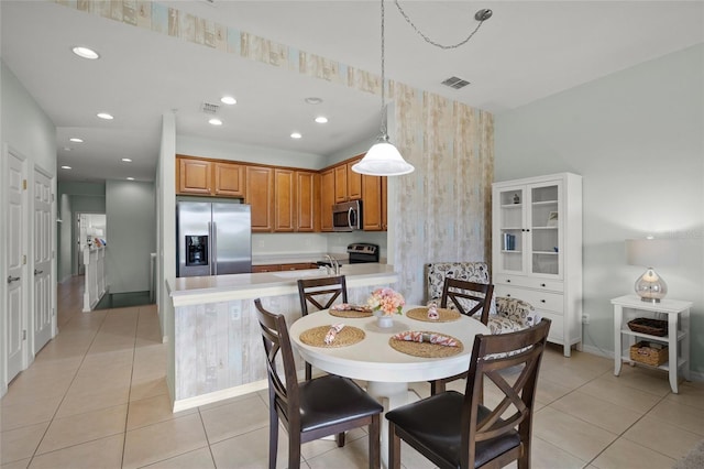 4204 Overture Cir # 4204, Bradenton, FL 34209 - dining space featuring light tile patterned floors, wallpapered walls, and recessed lighting