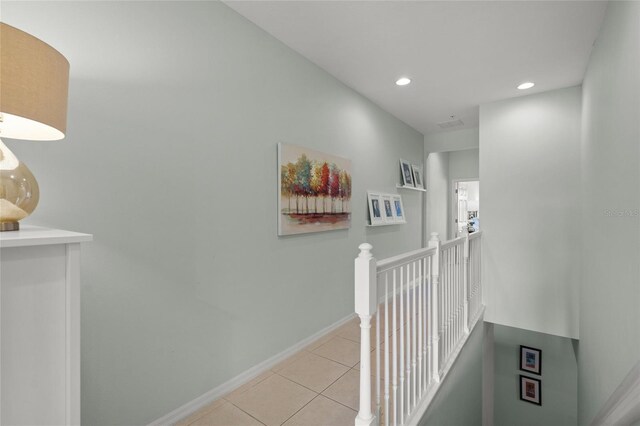4204 Overture Cir # 4204, Bradenton, FL 34209 - corridor featuring an upstairs landing, light tile patterned flooring, and recessed lighting