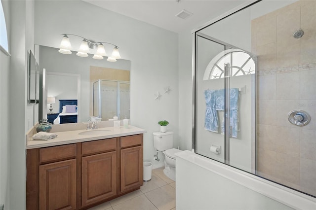 4204 Overture Cir # 4204, Bradenton, FL 34209 - ensuite bathroom featuring a stall shower, vanity, and tile patterned floors