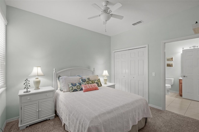 4204 Overture Cir # 4204, Bradenton, FL 34209 - carpeted bedroom featuring a closet, ensuite bath, and a ceiling fan