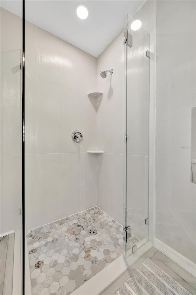 9822 Desoto Ct, Bradenton, FL 34210 - full bath featuring a shower stall and tile patterned flooring