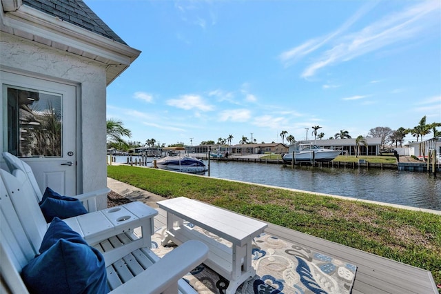9822 Desoto Ct, Bradenton, FL 34210 - view of patio / terrace featuring a water view, a dock, and a residential view