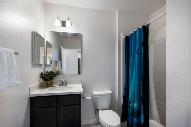 4739 Reisswood Loop, Palmetto, FL 34221 - bathroom featuring vanity, toilet, and shower / bath combo