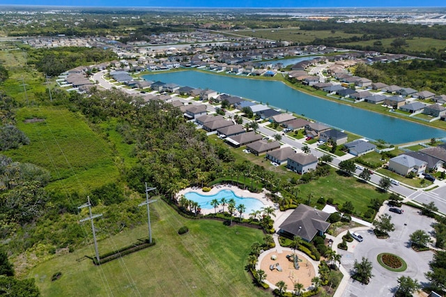 4739 Reisswood Loop, Palmetto, FL 34221 - aerial view of property's location featuring nearby suburban area, a large body of water, and a pool area