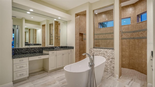 6914 Dominion Ln, Lakewood Ranch, FL 34202 - full bath with a freestanding bath, a walk in shower, vanity, recessed lighting, and marble finish floors