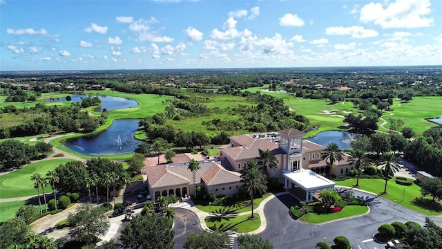 6914 Dominion Ln, Lakewood Ranch, FL 34202 - aerial perspective of suburban area with a large body of water and a golf club
