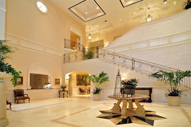 6914 Dominion Ln, Lakewood Ranch, FL 34202 - lobby featuring a high ceiling, stairway, and recessed lighting