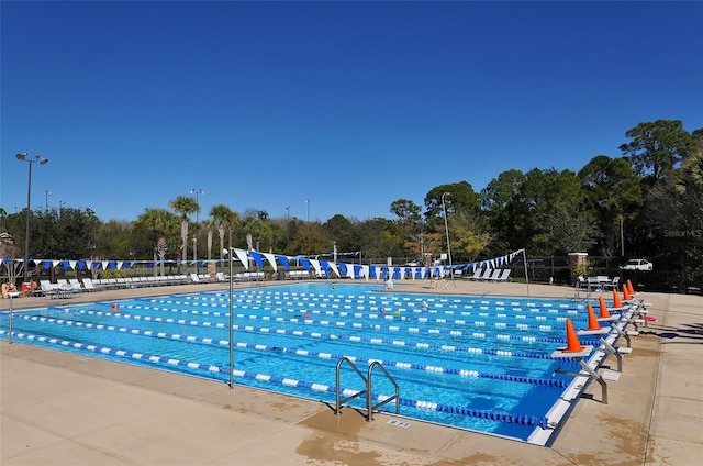 6914 Dominion Ln, Lakewood Ranch, FL 34202 - community pool featuring view of scattered trees