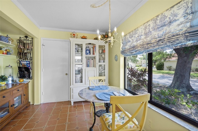 4109 Carriage Dr Unit 23, Sarasota, FL 34241 - dining room featuring a chandelier, crown molding, and tile patterned flooring